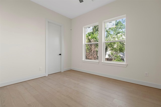 5117 Schuler St Unit B, Houston, TX 77007 - spare room with light wood finished floors and a ceiling fan