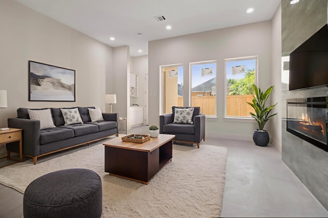 5117 Schuler St Unit B, Houston, TX 77007 - living area featuring a tiled fireplace and recessed lighting
