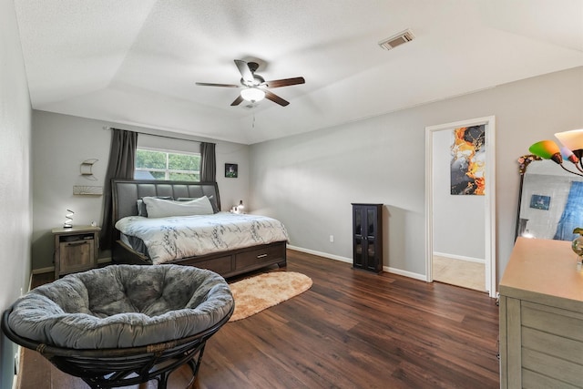 17010 Cypress Knee Dr, Cypress, TX 77429 - bedroom featuring dark wood-style flooring, vaulted ceiling, and ceiling fan