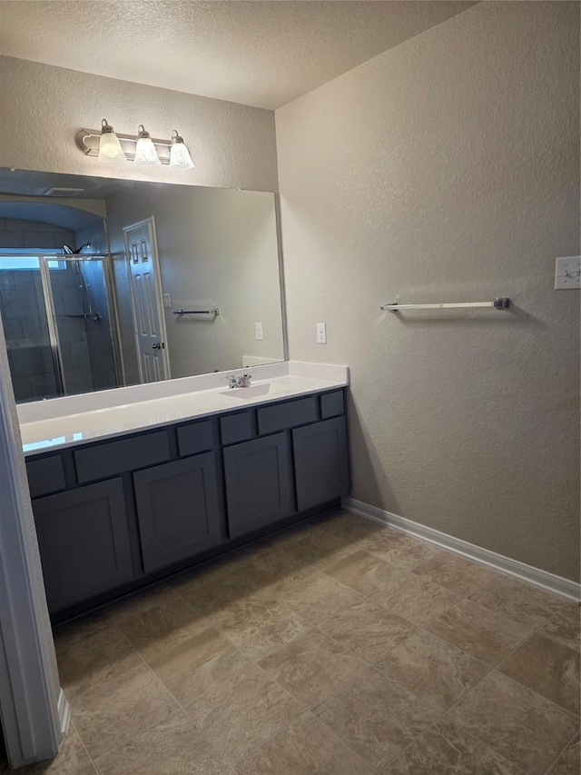 15319 Roaming River Trl, Houston, TX 77044 - full bathroom with a textured wall, vanity, and a textured ceiling