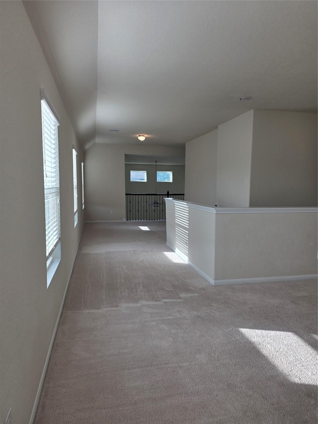 15319 Roaming River Trl, Houston, TX 77044 - spare room with light carpet and vaulted ceiling