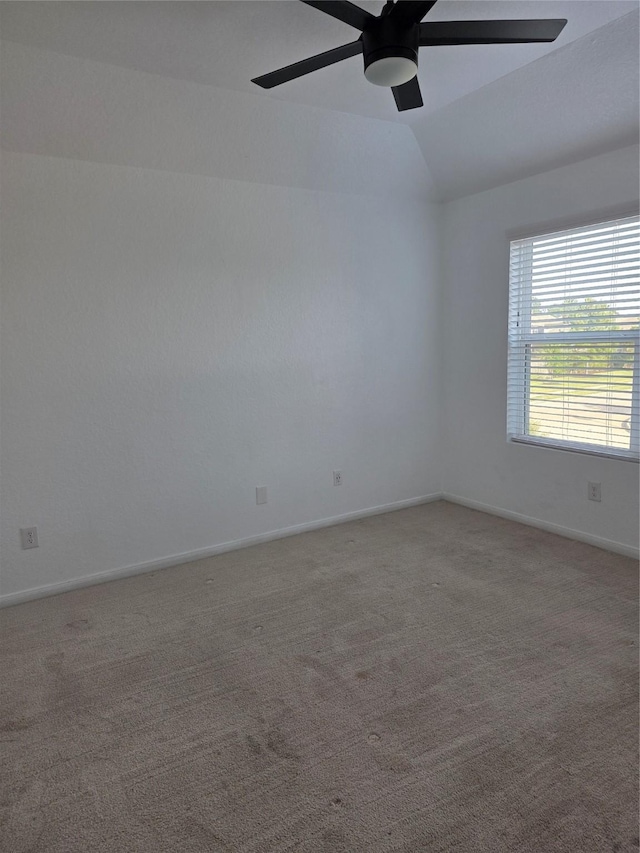 15319 Roaming River Trl, Houston, TX 77044 - spare room featuring a ceiling fan, vaulted ceiling, and carpet