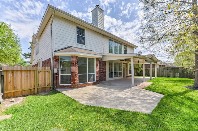 1622 Maryvale Dr, Katy, TX 77494 - rear view of property with brick siding, a ceiling fan, a chimney, a patio, and a fenced backyard