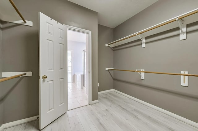 1622 Maryvale Dr, Katy, TX 77494 - walk in closet with light wood-type flooring