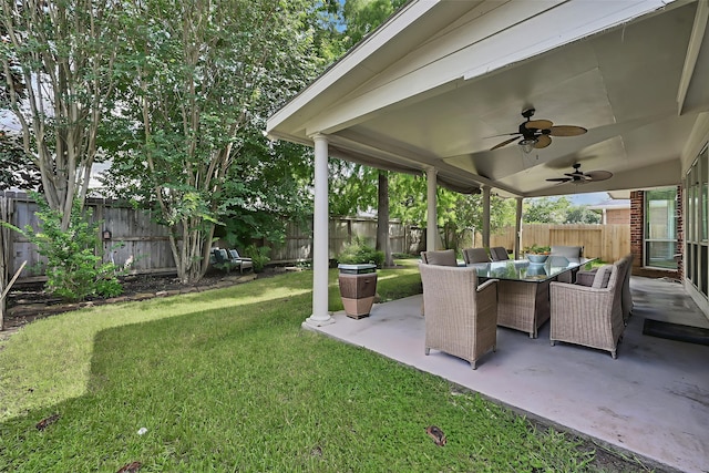 1622 Maryvale Dr, Katy, TX 77494 - fenced backyard with a patio, ceiling fan, and outdoor dining space