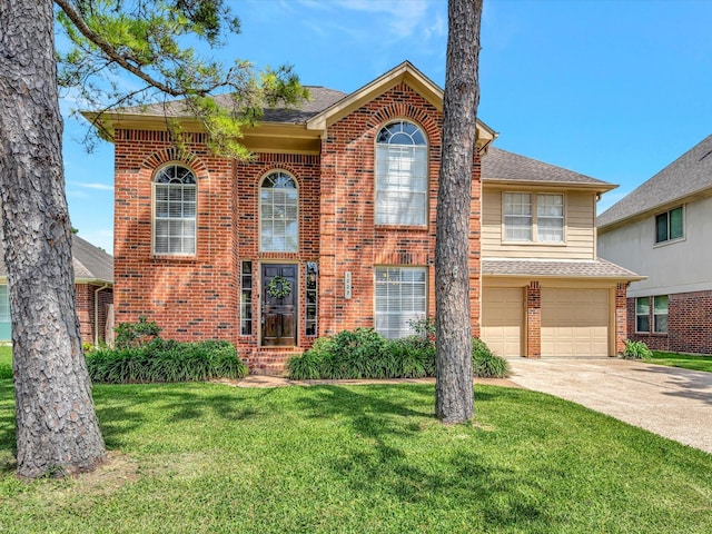 1227 Redwood Bough Ln, Houston, TX 77062 - view of front of home with brick siding, an attached garage, concrete driveway, and a front lawn