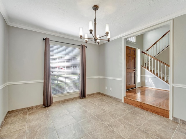 1227 Redwood Bough Ln, Houston, TX 77062 - spare room with a chandelier, light tile patterned flooring, ornamental molding, stairway, and a textured ceiling