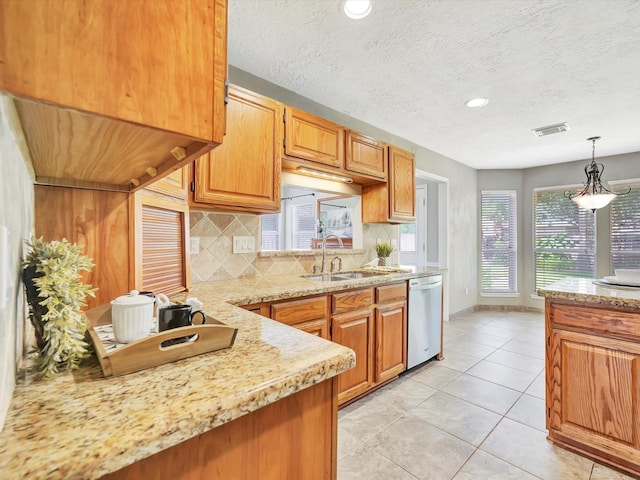 1227 Redwood Bough Ln, Houston, TX 77062 - kitchen with stainless steel dishwasher, backsplash, decorative light fixtures, light tile patterned floors, and light stone counters