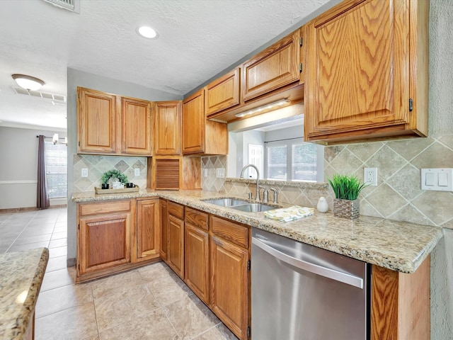 1227 Redwood Bough Ln, Houston, TX 77062 - kitchen with dishwasher, healthy amount of natural light, light tile patterned floors, and a textured ceiling