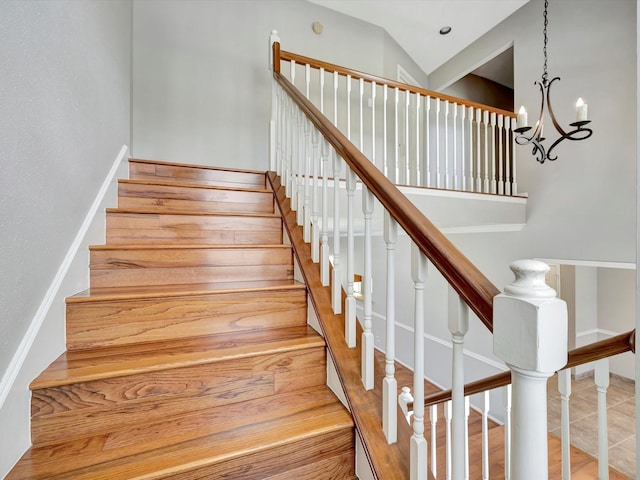 1227 Redwood Bough Ln, Houston, TX 77062 - staircase featuring a chandelier and baseboards