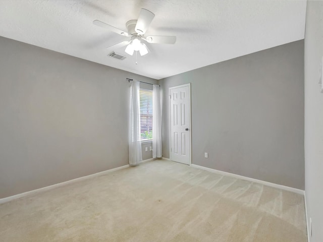 1227 Redwood Bough Ln, Houston, TX 77062 - carpeted spare room with ceiling fan and a textured ceiling