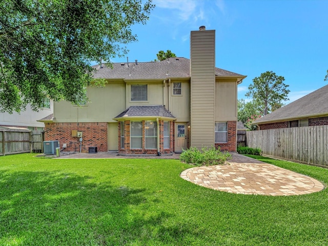 1227 Redwood Bough Ln, Houston, TX 77062 - back of house featuring a patio area, brick siding, a chimney, and a fenced backyard