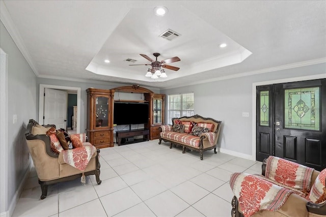11156 Country Ln, Beaumont, TX 77705 - living area featuring a tray ceiling, light tile patterned floors, ceiling fan, recessed lighting, and ornamental molding