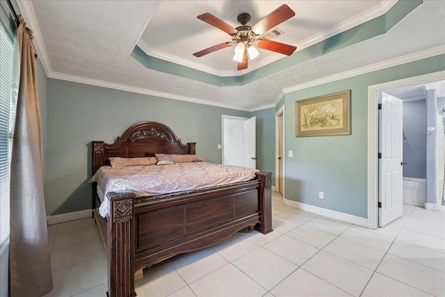 11156 Country Ln, Beaumont, TX 77705 - bedroom with a tray ceiling, light tile patterned floors, crown molding, a ceiling fan, and ensuite bathroom