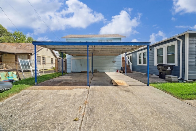 1115 Alber St, Houston, TX 77009 - view of front of home featuring driveway and a carport