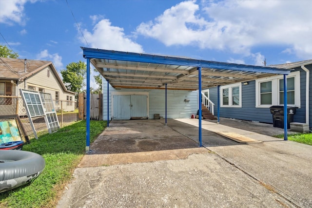 1115 Alber St, Houston, TX 77009 - exterior space with concrete driveway and a carport