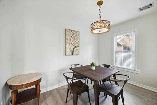 1115 Alber St, Houston, TX 77009 - dining room featuring wood finished floors and baseboards