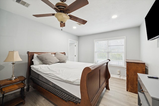 1115 Alber St, Houston, TX 77009 - bedroom with light wood-type flooring, recessed lighting, and a ceiling fan