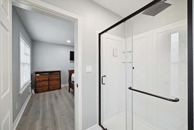 1115 Alber St, Houston, TX 77009 - bathroom featuring a shower stall, wood finished floors, and recessed lighting