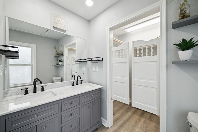 1115 Alber St, Houston, TX 77009 - full bathroom featuring wood finished floors and double vanity