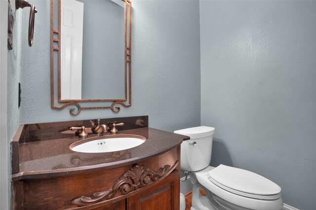 6616 Queensclub Dr, Houston, TX 77069 - bathroom featuring vanity and a textured wall