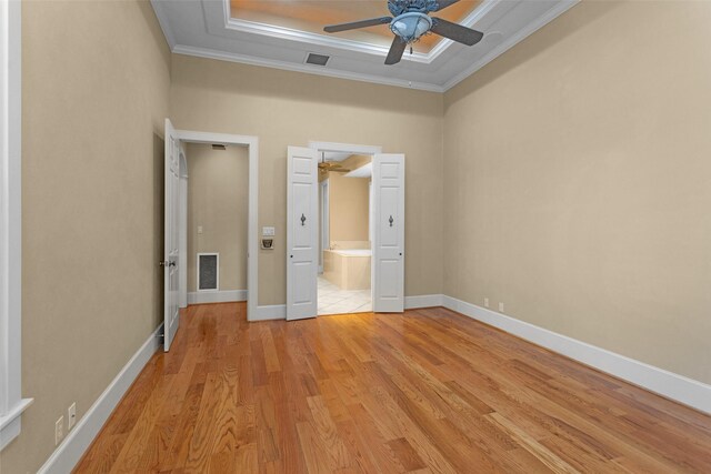 6616 Queensclub Dr, Houston, TX 77069 - unfurnished bedroom featuring ornamental molding, light wood-style floors, connected bathroom, and a ceiling fan