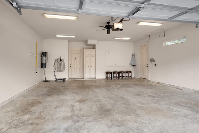 6616 Queensclub Dr, Houston, TX 77069 - garage with a garage door opener and a central vacuum unit