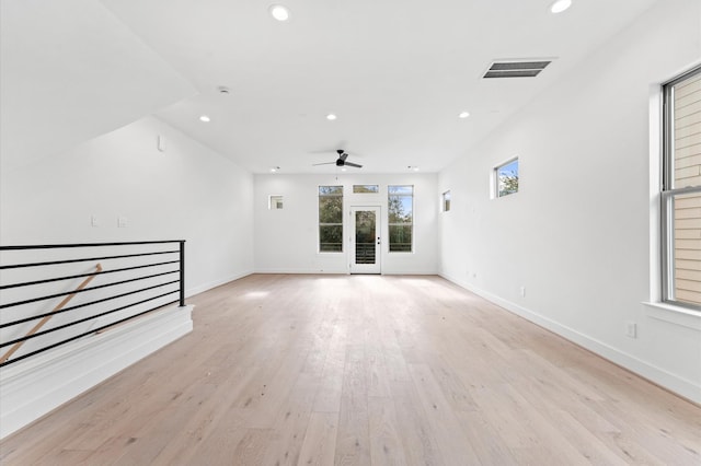 5505 Kansas St, Houston, TX 77007 - unfurnished living room with recessed lighting, light wood-style flooring, and a ceiling fan