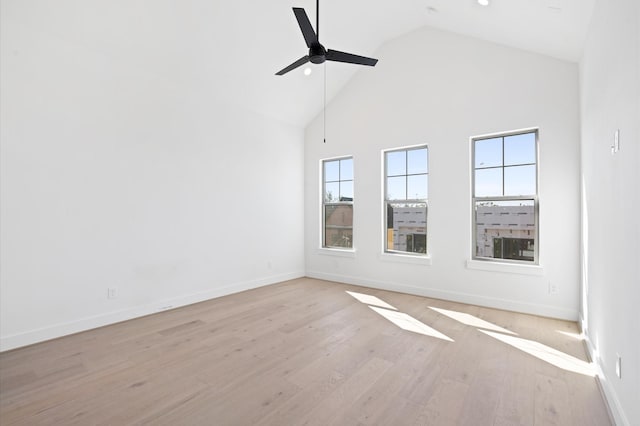 5505 Kansas St, Houston, TX 77007 - empty room with high vaulted ceiling, a ceiling fan, and wood finished floors