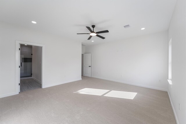 256 Davis Bend Rd, Alvin, TX 77511 - unfurnished bedroom featuring light colored carpet, recessed lighting, ceiling fan, and ensuite bathroom