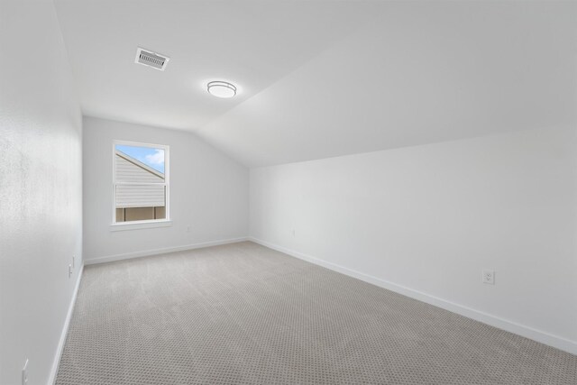 256 Davis Bend Rd, Alvin, TX 77511 - bonus room featuring light carpet and lofted ceiling