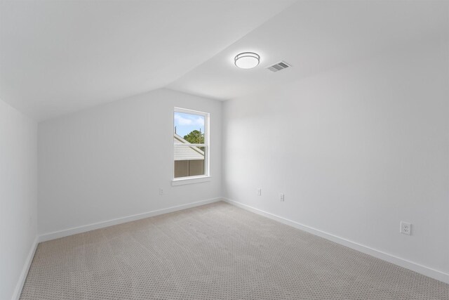 256 Davis Bend Rd, Alvin, TX 77511 - bonus room featuring light colored carpet and lofted ceiling