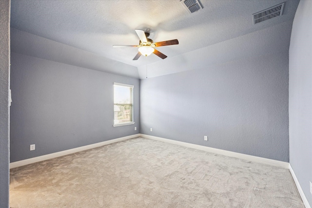 4906 Lodge Lake Dr, Fulshear, TX 77441 - carpeted empty room featuring a ceiling fan and a textured ceiling