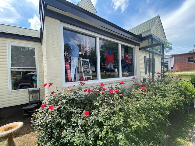 312 Spring, Washington, GA 30673 - view of home's exterior featuring a shingled roof
