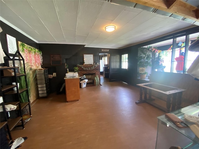 312 Spring, Washington, GA 30673 - living area featuring a fireplace, wood finished floors, and crown molding