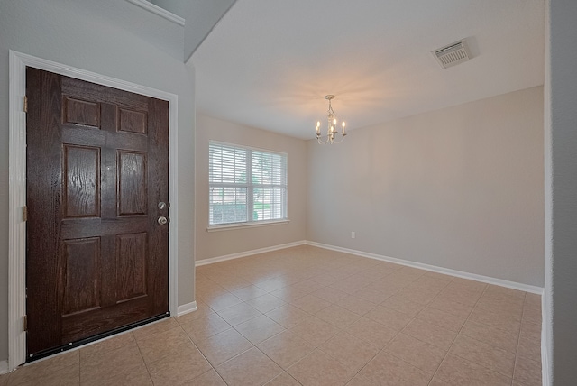 9714 Angleside Ln, Sugar Land, TX 77498 - foyer with a chandelier and light tile patterned floors