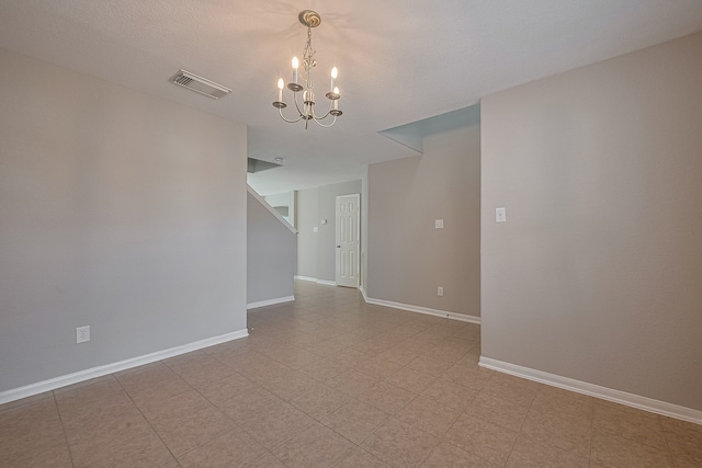 9714 Angleside Ln, Sugar Land, TX 77498 - unfurnished room featuring a chandelier and baseboards