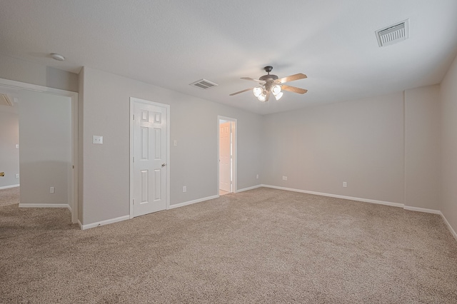 9714 Angleside Ln, Sugar Land, TX 77498 - spare room featuring ceiling fan, carpet floors, and a smoke detector