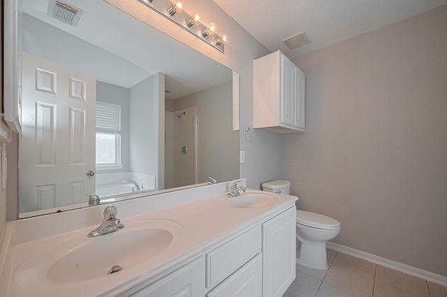 9714 Angleside Ln, Sugar Land, TX 77498 - full bath with a bath, a stall shower, double vanity, and tile patterned floors