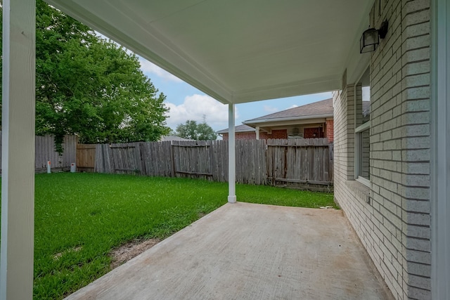 9714 Angleside Ln, Sugar Land, TX 77498 - fenced backyard with a patio area