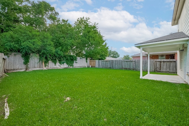 9714 Angleside Ln, Sugar Land, TX 77498 - fenced backyard featuring a patio area