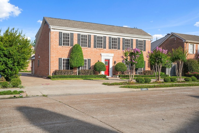 2200 Potomac Dr, Houston, TX 77057 - colonial home featuring brick siding