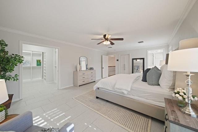 2200 Potomac Dr, Houston, TX 77057 - bedroom featuring ornamental molding, a walk in closet, and ceiling fan
