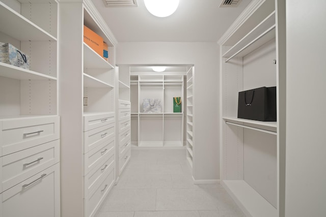2200 Potomac Dr, Houston, TX 77057 - walk in closet with light tile patterned floors