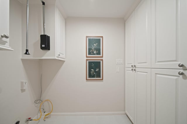 2200 Potomac Dr, Houston, TX 77057 - laundry room featuring baseboards