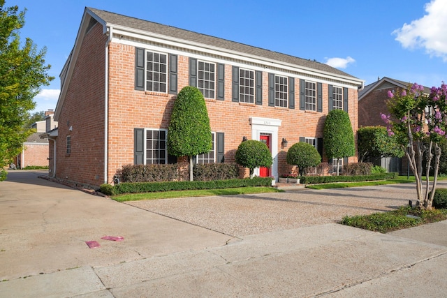 2200 Potomac Dr, Houston, TX 77057 - colonial home featuring brick siding