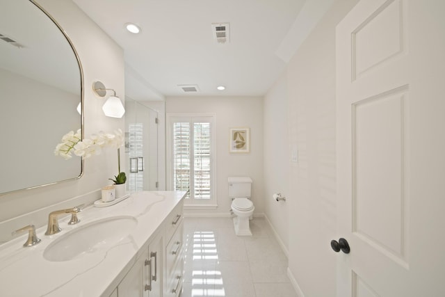 2200 Potomac Dr, Houston, TX 77057 - full bath with tile patterned flooring, vanity, an enclosed shower, and recessed lighting