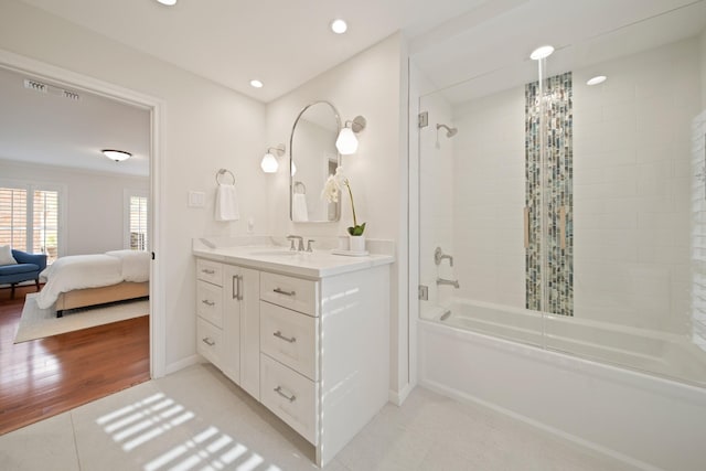 2200 Potomac Dr, Houston, TX 77057 - ensuite bathroom featuring bathtub / shower combination, vanity, tile patterned flooring, and recessed lighting