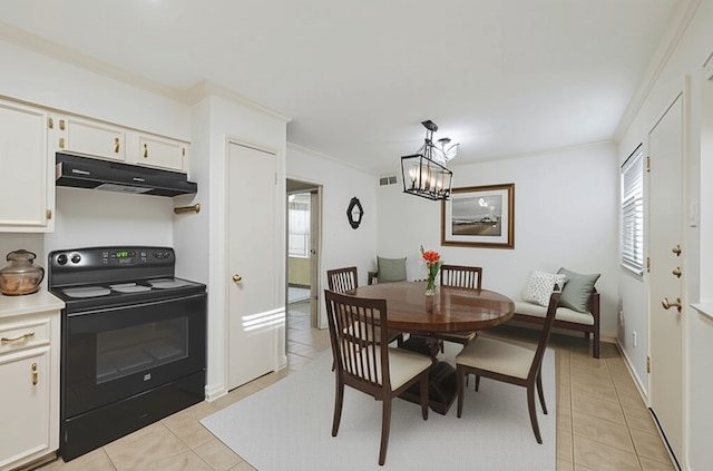 4040 San Felipe St Unit 135, Houston, TX 77027 - dining room with light tile patterned floors, a chandelier, and ornamental molding