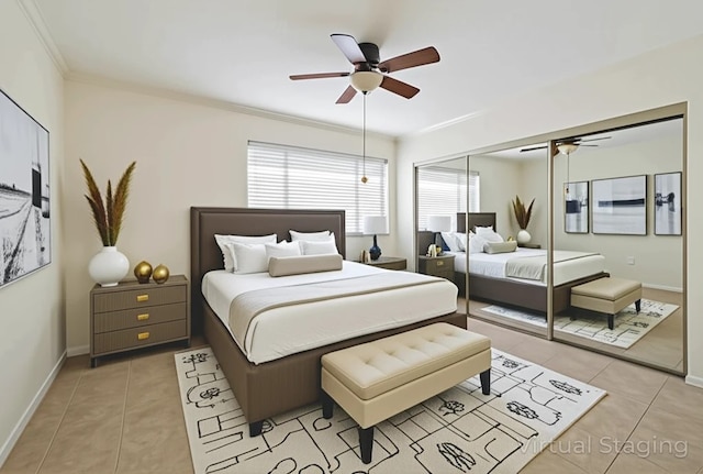 4040 San Felipe St Unit 135, Houston, TX 77027 - bedroom featuring light tile patterned flooring, ornamental molding, a closet, and ceiling fan